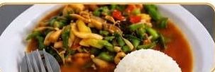 Pad ka pao stir fry with green vegetables and rice